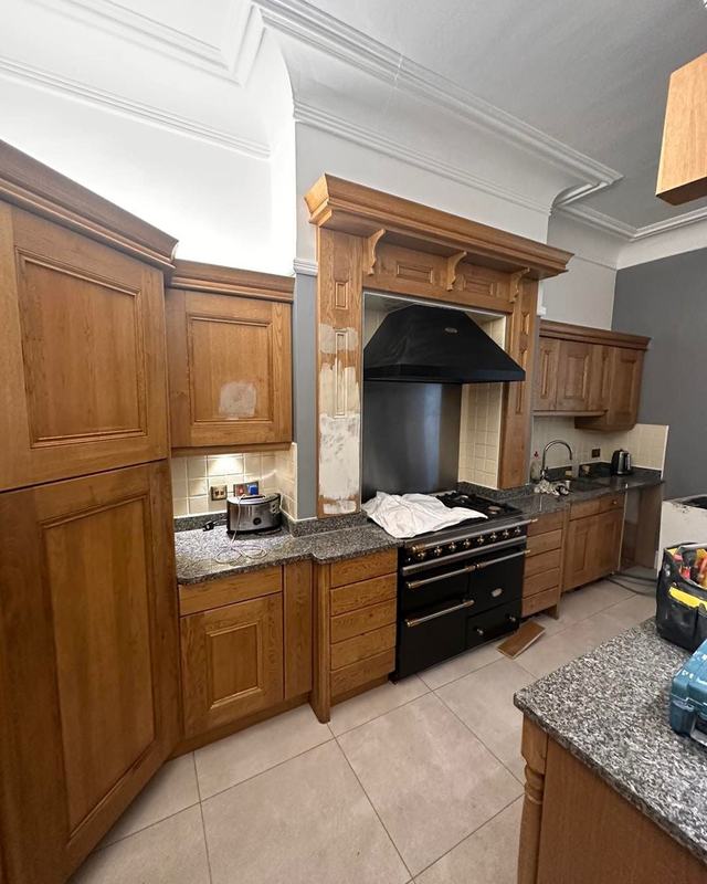 Large oak kitchen with a range cooker, before