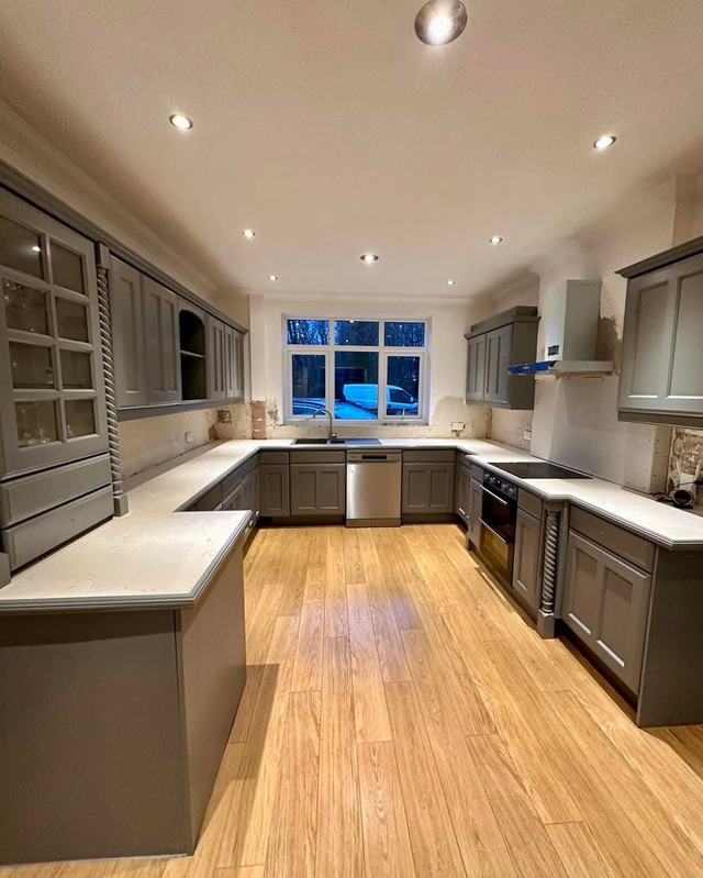 The same kitchen hand painted in a deep grey