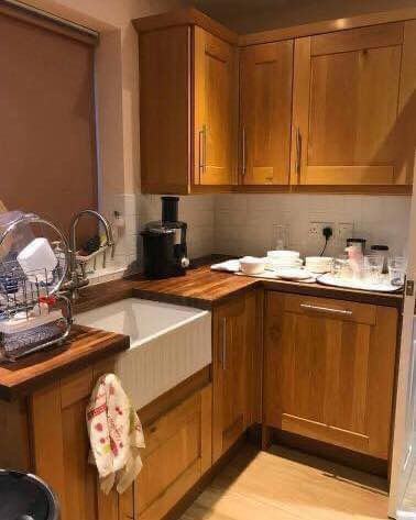 Oak kitchen with a Belfast sink, before