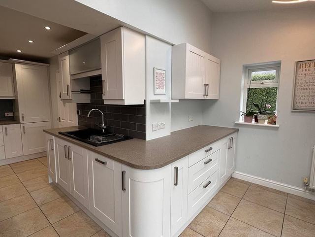 The same kitchen hand painted white