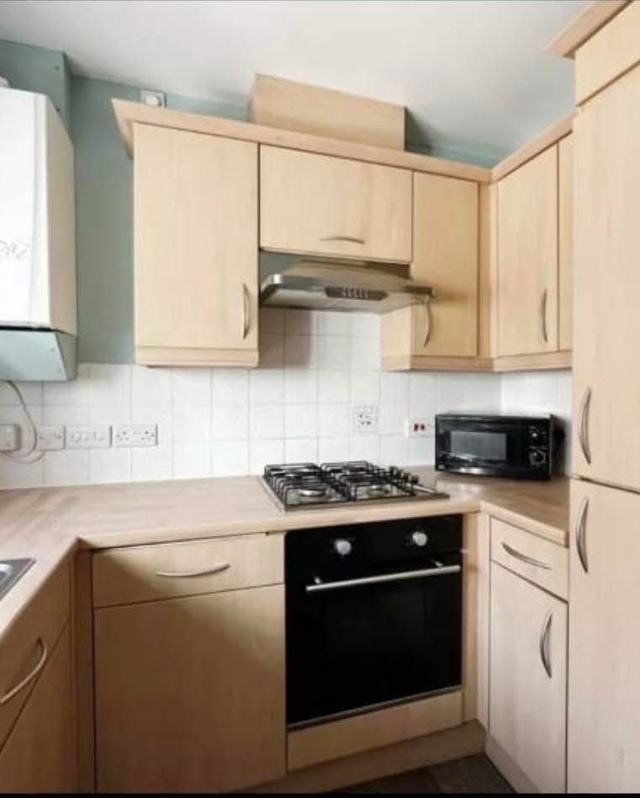 Kitchen with beech and cream doors, before