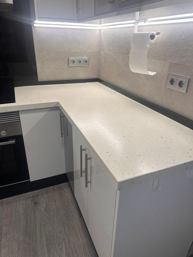 White Spray Granite L-shaped worktop